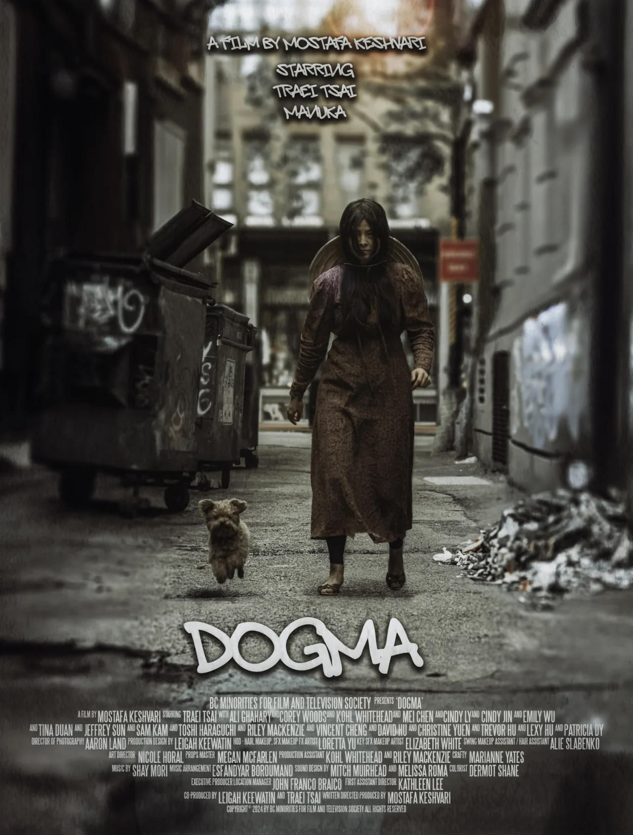 Dogma film poster in a rain-soaked city alley